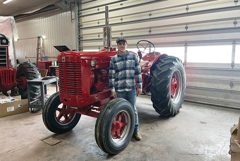 Restoring grandfather’s tractor is a great project for Charlan student
